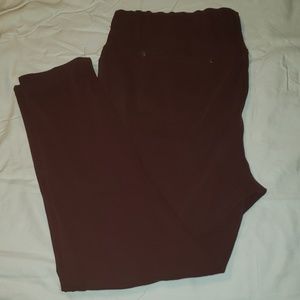 Maroon jeggings.